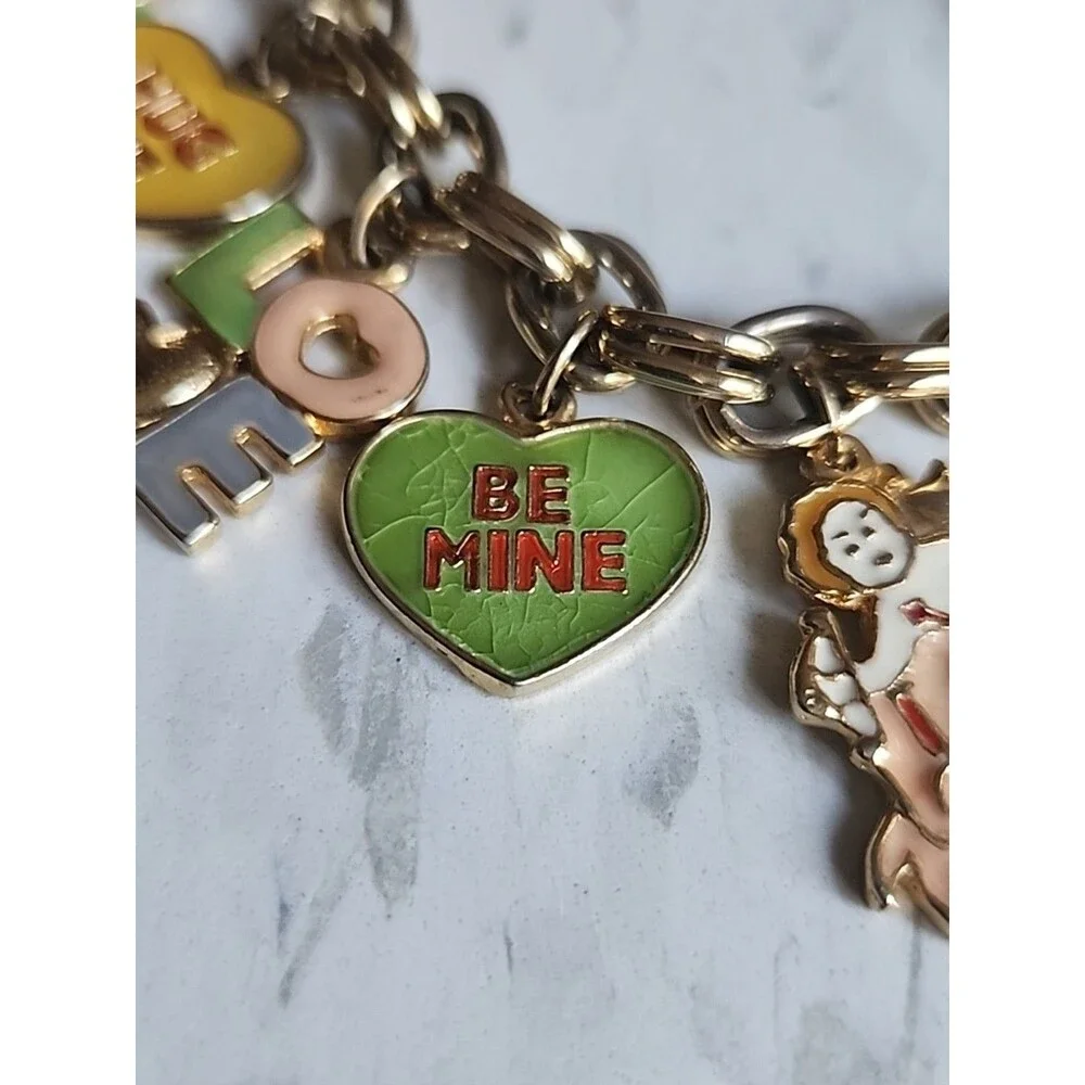 Charm Braclet, Love, Valentine's Day, Hearts, Hugs and Kisses Gold Tone Braclet.